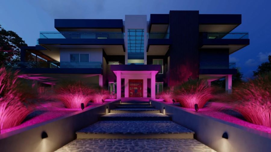 Outdoor landscape and step lighting created by Coastal Source’s Ketra-Ready fixtures leading to a modern home.