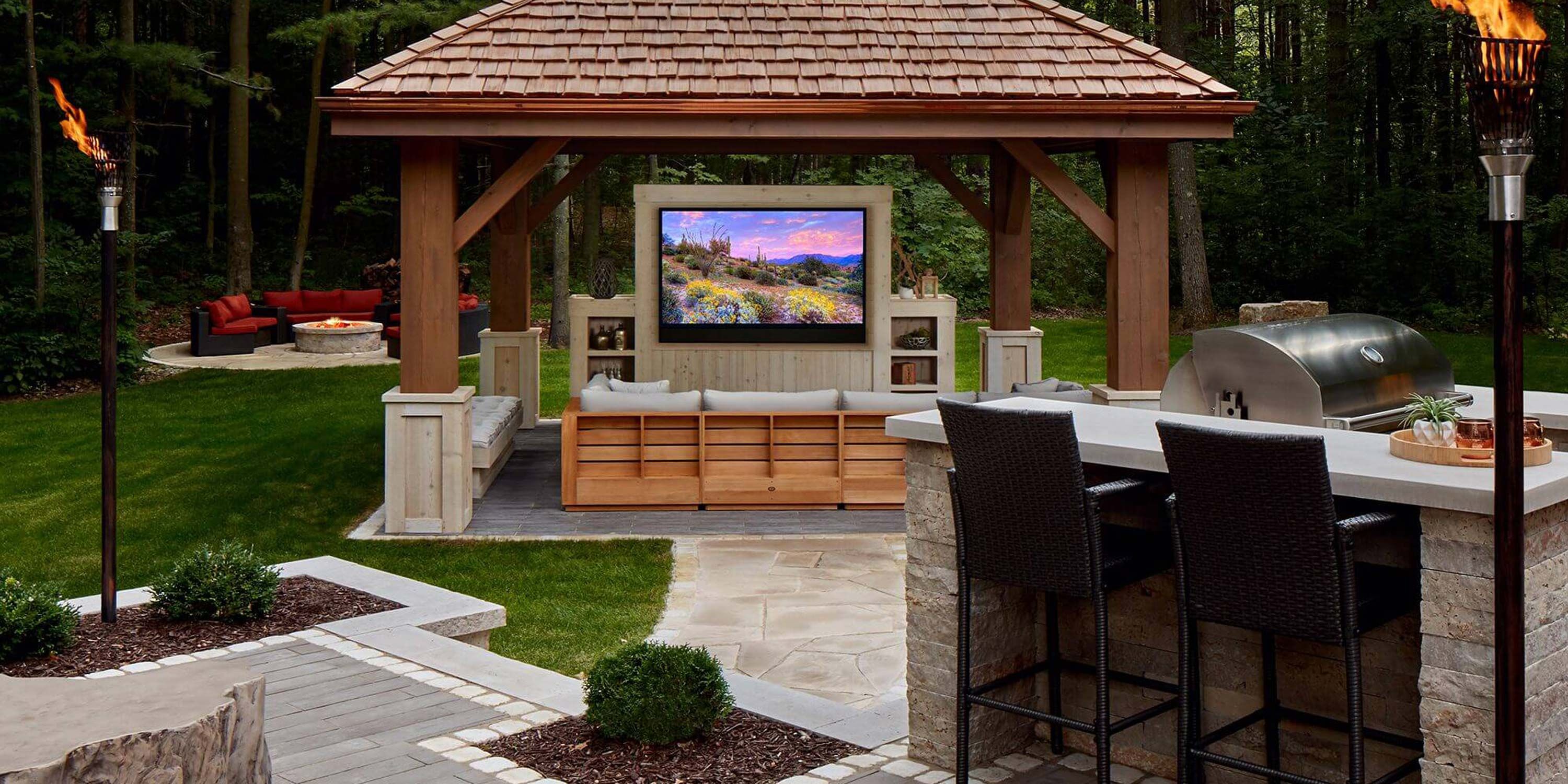 wooden gazebo in cape cod backyard with large outdoor tv seura