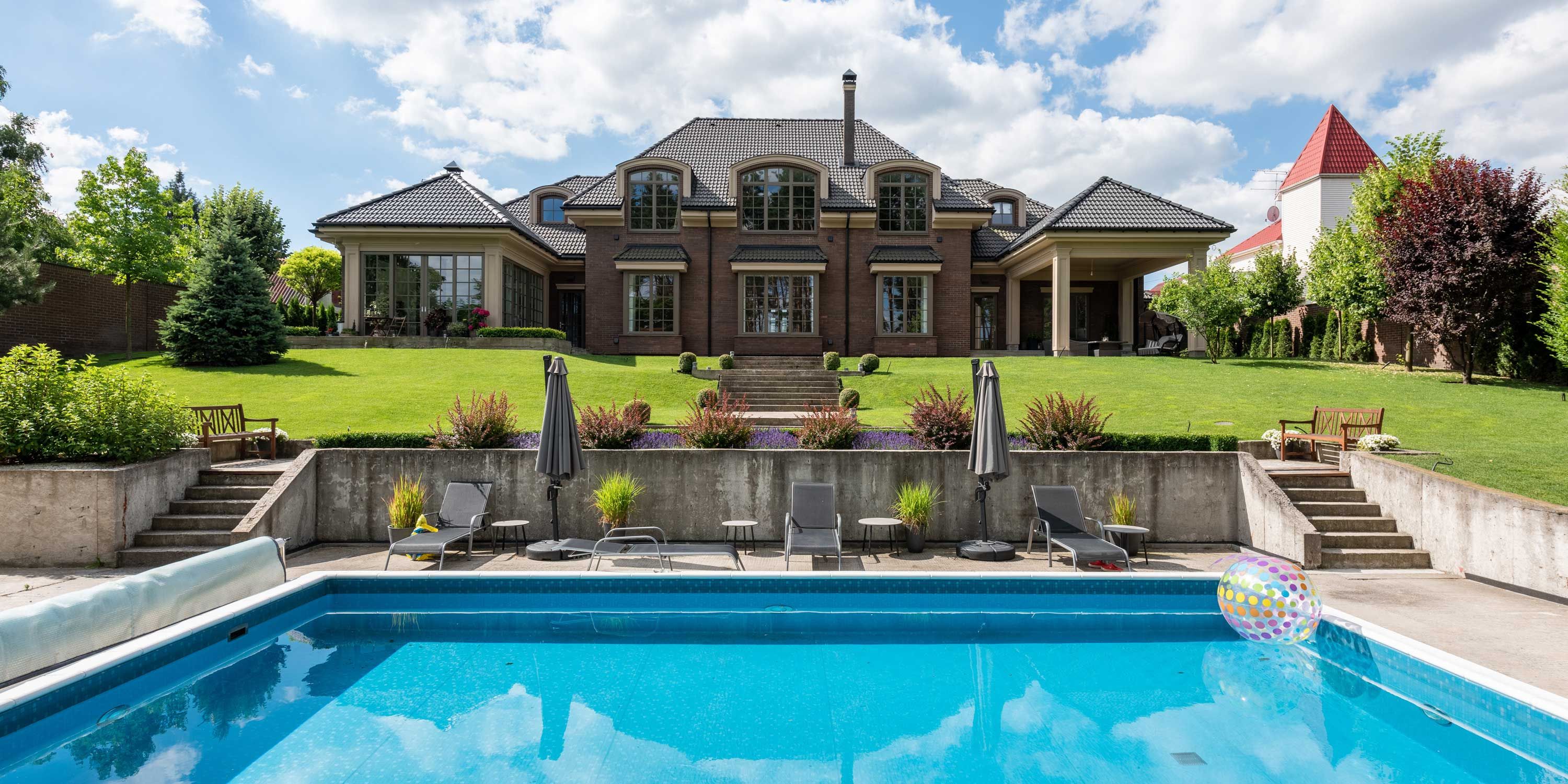 wine country home with pool and blue skies